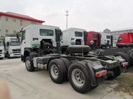 Sinotruk Howo 6x4 caminhão do reboque de trator noun de 420 cavalos-força com o motor D12.40 e a cabine HW76
