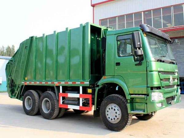 Caminhão de lixo 9,726 litro da compressão do transporte do objetivo especial de SINOTRUK HOWO deslocamento